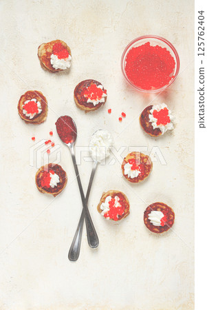 Demidoff pancakes, mini pancakes, with sour cream and red caviar, crepes. homemade, no people, 125762404