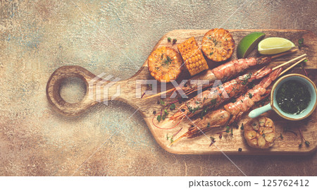 langoustines on skewers, shrimp kebab, with fried corn, spices and herbs, homemade, no people, 125762412