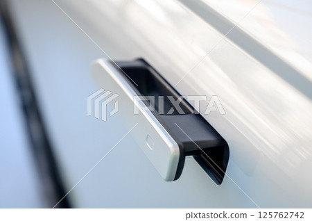 Modern door handle new car. Smart retractable door handles 125762742