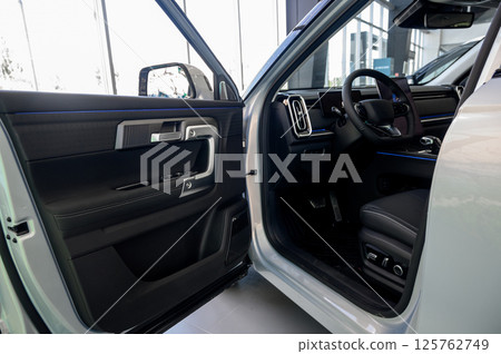 Interior of a modern car with black leather seats 125762749