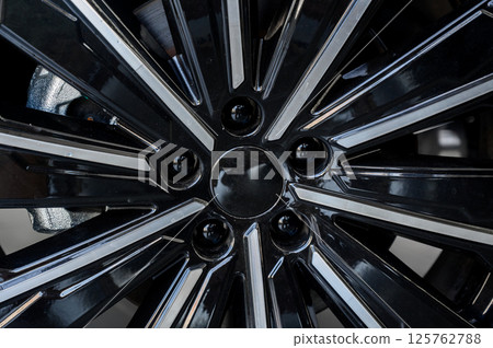 Car wheel with brake calipers and stylish design. Car wheel with brake calipers and stylish design. 125762788