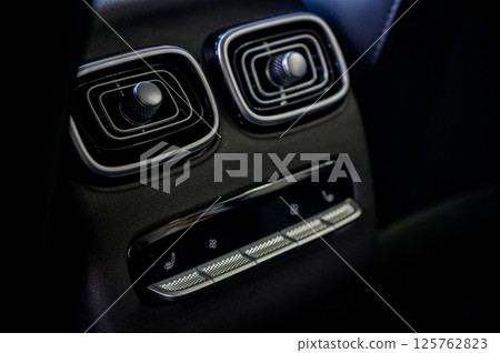 Car air conditioner close-up. Air conditioner flow inside the car. 125762823