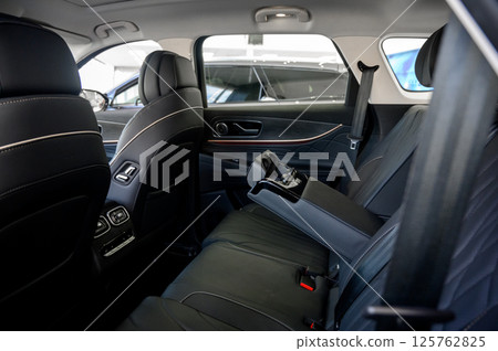 Interior of a modern car with black leather seats 125762825