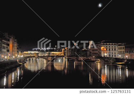 View of the Ponte Vecchio and Ponte Santa Trinita from the Ponte Carraia on the Arno River in Florence, Italy View of the Ponte Vecchio and Ponte Santa Trinita from the Ponte Carraia on the Arno River in Florence, Italy 125763131