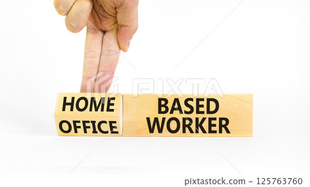 Home or office based worker symbol. Concept words Office based worker Home based worker on wooden cubes. Beautiful white background. Business, home or office based worker concept. Copy space. Home or office based worker symbol. Concept words Office based worker Home based worker on wooden cubes. Beautiful white background. Business, home or office based worker concept. Copy space. 125763760