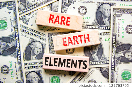 Rare earth elements symbol. Concept words Rare earth elements on beautiful wooden blocks. Dollar bills. Beautiful background from dollar bills. Business and rare earth elements concept. Copy space. Rare earth elements symbol. Concept words Rare earth elements on beautiful wooden blocks. Dollar bills. Beautiful background from dollar bills. Business and rare earth elements concept. Copy space. 125763795