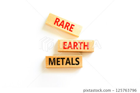 Rare earth metals symbol. Concept words Rare earth metals on beautiful wooden block. Beautiful white table white background. Business and rare earth metals concept. Copy space. Rare earth metals symbol. Concept words Rare earth metals on beautiful wooden block. Beautiful white table white background. Business and rare earth metals concept. Copy space. 125763796