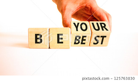 Motivational be your best symbol. Concept words Be your best on beautiful wooden block. Beautiful white background Businessman hand. Business motivational be your best concept. Copy space. 125763830