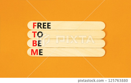 FTBM Free To Be Me symbol. Concept word FTBM Free To Be Me on beautiful wooden sticks. Beautiful orange background. Business motivational FTBM Free To Be Me concept. Copy space. FTBM Free To Be Me symbol. Concept word FTBM Free To Be Me on beautiful wooden sticks. Beautiful orange background. Business motivational FTBM Free To Be Me concept. Copy space. 125763880