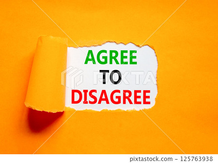 Agree to disagree symbol. Concept words Agree to disagree on beautiful white paper. Beautiful orange paper background. Business and agree to disagree concept. Copy space. Agree to disagree symbol. Concept words Agree to disagree on beautiful white paper. Beautiful orange paper background. Business and agree to disagree concept. Copy space. 125763938