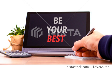 Motivational be your best symbol. Concept words Be your best on beautiful black tablet. Beautiful white background. Businessman hand. Business motivational be your best concept. Copy space. Motivational be your best symbol. Concept words Be your best on beautiful black tablet. Beautiful white background. Businessman hand. Business motivational be your best concept. Copy space. 125763946