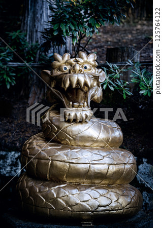 The golden dragon god statue at Nikko Futarasan Shrine 125764122