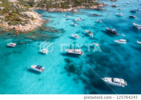Aerial view of luxury yachts and boats in blue sea in summer 125764245