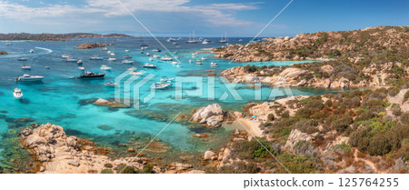 Aerial view of luxury yachts and boats in blue sea in summer 125764255