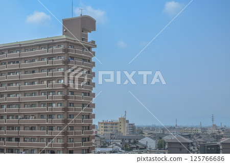 March 26 2025 Modern Urban Apartment Building with Scenic Skyline, Japan, Japan March 26 2025 Modern Urban Apartment Building with Scenic Skyline, Japan, Japan 125766686