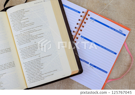 24 April 2025 Washington DC US Holy Bible with literary text alongside planner featuring weekly layout for organizing upcoming events. 24 April 2025 Washington DC US Holy Bible with literary text alongside planner featuring weekly layout for organizing upcoming events. 125767045