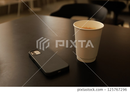 Minimalist Coffee and Modern Workspace Aesthetic 125767296