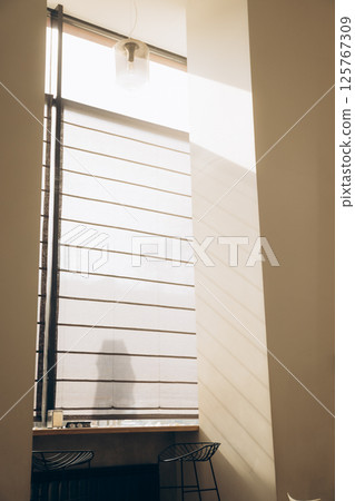 Minimalist Coffee and Modern Workspace Aesthetic 125767309