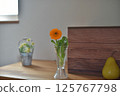 Vase flower calendula 125767798