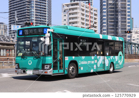 New paint job for Osaka City train running near Nakatsu Station 125770929