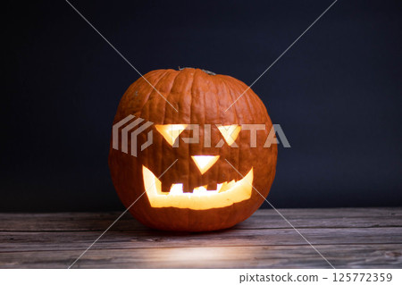 one halloween pumpkin neutral background one halloween pumpkin neutral background 125772359
