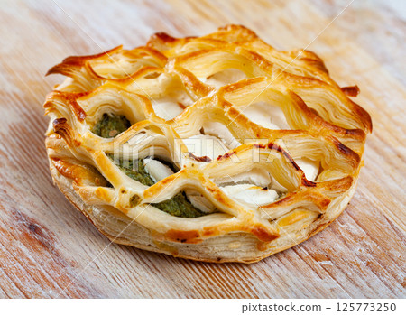 Pastry stuffed with goat cheese and spinach Pastry stuffed with goat cheese and spinach 125773250