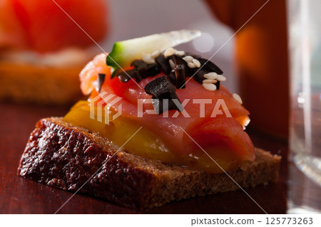 Delicious settee-bed with salmon Delicious settee-bed with salmon 125773263