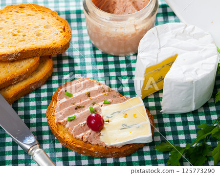 Toast with pate and blue cheese 125773290
