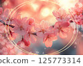 A gorgeous spring design with cherry blossoms and a gold line frame wrapped in light 125773314