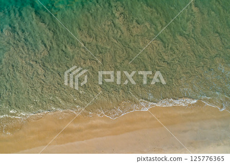 Aerial view sea surface water background,Nature ocean sea background,Top view nature sea surface background 125776365