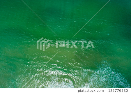 Aerial view sea surface water background,Nature ocean sea background,Top view nature sea surface background 125776380