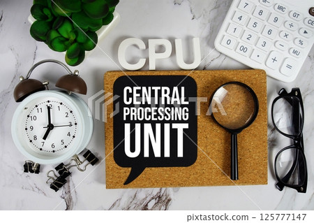 CPU - Central Processing Unit acronym with calculator, alarm clock and magnifying glass, business concept background CPU - Central Processing Unit acronym with calculator, alarm clock and magnifying glass, business concept background 125777147