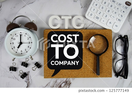 CTC - Cost To Company acronym with calculator, alarm clock and magnifying glass, business concept background CTC - Cost To Company acronym with calculator, alarm clock and magnifying glass, business concept background 125777149