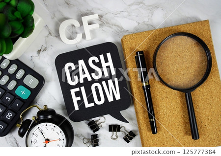 CF - Cash Flow acronym with calculator, alarm clock and magnifying glass, Business concept background 125777384
