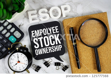 ESOP - Employee Stock Ownership Program acronym with calculator, alarm clock and magnifying glass, Business and Financial concept background 125777388