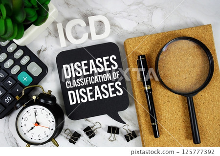 ICD - International Classification of Diseases acronym with calculator, alarm clock and magnifying glass, Business concept background 125777392