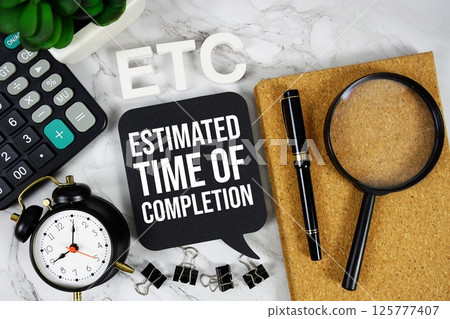 ETC - Estimated Time Of Completion acronym with calculator, alarm clock and magnifying glass, Business concept background ETC - Estimated Time Of Completion acronym with calculator, alarm clock and magnifying glass, Business concept background 125777407