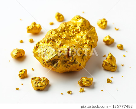 Glistening gold nuggets scattered on a white background showcasing their natural shine and unique shapes 125777492