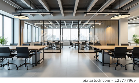 Modern office interior with abundant natural light and open workspaces in a bustling city environment Modern office interior with abundant natural light and open workspaces in a bustling city environment 125777969