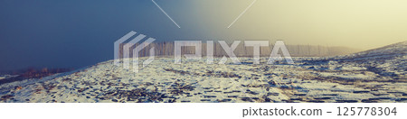 Fence on the mountain in the foggy morning. The mountain was covered with the first snow. Horizontal banner Fence on the mountain in the foggy morning. The mountain was covered with the first snow. Horizontal banner 125778304