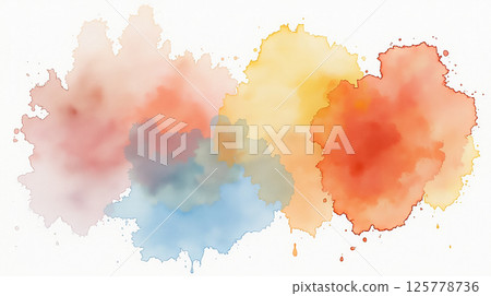 Colorful watercolor splashes decorating a blank canvas in a creative workspace 125778736