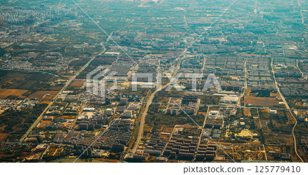 Beijing, China. View From Airplane Window On Multi-story Buildings Of Changhe Garden District In Beijing. Aerial View On Suburb. High-rise Houses Elevated View Cityscape Skyline. Urban Residential 125779410