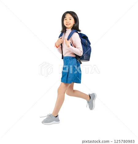 Elementary school girl jumping with a backpack. Full-body photo PNG with transparent background precisely cut out by hand. Elementary school girl jumping with a backpack. Full-body photo PNG with transparent background precisely cut out by hand. 125780983