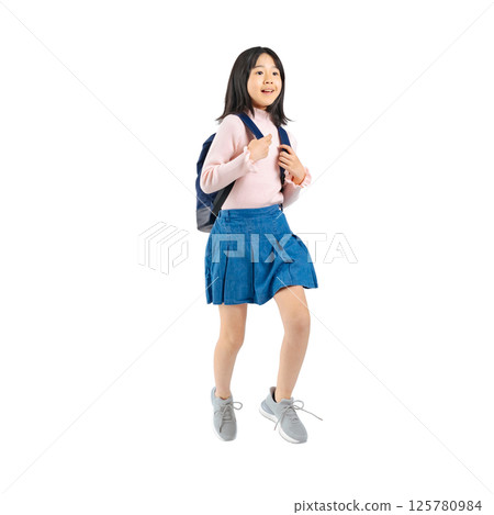 Elementary school girl jumping with a backpack. Full-body photo PNG with transparent background precisely cut out by hand. Elementary school girl jumping with a backpack. Full-body photo PNG with transparent background precisely cut out by hand. 125780984