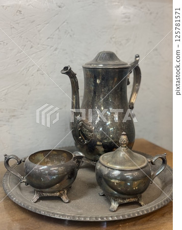 Victorian Elegance: A Silver Tea Service's Tale Victorian Elegance: A Silver Tea Service's Tale 125781571