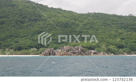 view from boat in Indian ocean sailing between Seychelles islands in daytime view from boat in Indian ocean sailing between Seychelles islands in daytime 125782136