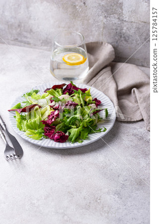 Bowl of fresh green salad mix Bowl of fresh green salad mix 125784157