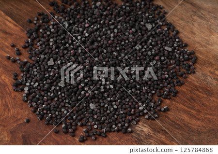 Candy sprinkle pile, round sugar sprinkles, small sweet color confectionery decoration balls Candy sprinkle pile, round sugar sprinkles, small sweet color confectionery decoration balls 125784868