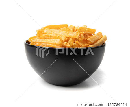 Fried chips sticks isolated, finger potato chips, golden shoestring fries pile, French fries Fried chips sticks isolated, finger potato chips, golden shoestring fries pile, French fries 125784914