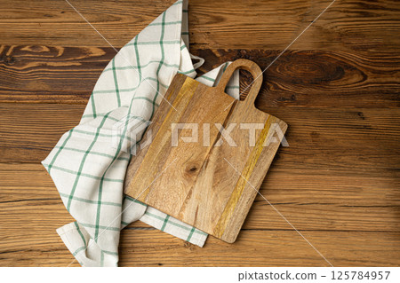 Empty Cutting Board Texture Background, Wooden Chopping Board Mockup with Copy Space for Text Empty Cutting Board Texture Background, Wooden Chopping Board Mockup with Copy Space for Text 125784957